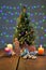 Festively decorated Christmas tree with candles and illumination