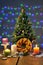 Festively decorated Christmas tree with candles and illumination