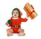 Festively dressed baby with gift box on white. Christmas celebration