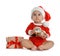 Festively dressed little baby with Christmas gift