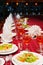 Festively served banquet table with glasses