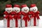 Festively Wrapped Christmas Gifts Shaped as Adorable Snowmen with Delightful Red Bows