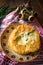 Feta cheese and green onion fried pies section on a rustic plate