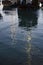 Fethiye. Turkey.reflection of the masts of yachts in the water