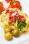 Fettuccine pasta with cherry tomato and olives