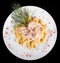 Fettuccine pasta with meat, cream sauce and herbs, in bowl isolated