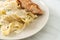 Fettucine pasta white creamy sauce with grilled chicken