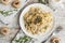 Fetuchini alfredo with mushrooms and chicken ham in creamy cheese sauce