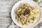 Fetuchini alfredo with mushrooms and chicken ham in creamy cheese sauce