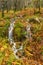 A few days of heavy rain in the English Lake District led to streams of water running off the autumnal colored fells