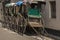 Few famous hand pulled rickshaw parked road side on streets of Kolkata