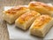 Few fresh rolls with a delicious crust of puff pastry, close-up