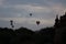 A few hot air balloons in the sky during early morning in Bagan, Nyaung-U, Myanmar