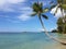 Few palm trees over stunning tropical lagoon