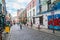 Few people walking in narrow quaint cobbled street in Temple Bar