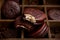 A few sweet Choco pie desserts on a wooden background among scattered coffee beans