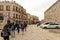 Few tourists walk on a rainy day near the Yafo Gate in the old city of Jerusalem, Israel