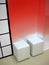 Few white seat, red wall, interior,