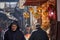 Fez, Morocco - December 07, 2018: Moroccan man walking in the fez medina next to a banana store