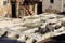 Fez, Morocco - January 01, 2010: Workers are dyeing and tanning leather at the tannery in Fez using the traditional