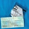 FFP2 mask of Jifa Group Co. Ltd. packed in foil on authorization certificates of the German government for the discounted purchase
