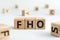 FHO - acronym from wooden blocks with letters