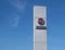 Fiat Professional logo in the dealership of the area, against blue sky. It is the brand name for Fiat group commercial vehicles