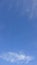 Fibrous clouds in blue sky, close-up