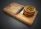 Fictitious crypto coin standing on mouse trap. 3D illustration