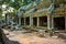 Ficus Strangulosa tree growing over a doorway Angkor Wat, Cambodia