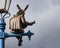 The Fiddler, the Mandolin Donkey and the Owl statues on lamp post in stratford upon avon