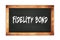 FIDELITY  BOND text written on wooden frame school blackboard