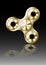 Fidget spinner icon - toy for stress relief and improvement of attention span. Filled gold metal