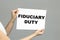 FIDUCIARY DUTY text is written on paper