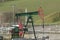Field fossil fuel pumpjack oil fracking crude extraction pump jack machine energy industry pumping unit equipment
