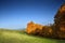 Field with hewed corn and clouds