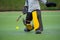 Field hockey goalkeeper on a green grass