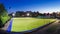 Field hockey stadium with lights at night