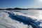 Field of ice hummocks on the frozen Lake Baikal. Russia