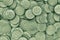 Field of Japanese 1 one yen coins close up. Background about economy, finance or banking in Japan. Light pale green tinted