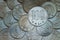 A field of Japanese coins in 1 yen, on it lies a coin of 100 yen. News about the economy, finances and interest rate of the