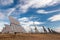 Field of photovoltaic solar panels gathering energy.