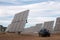 Field of photovoltaic solar panels gathering energy.