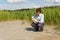 Field researcher biologist examines soil sample in vitro