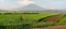 Field with Sumbing mountain in the background