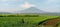 Field with Sumbing mountain in the background