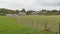 Fields with farms and houses and forests in the Wallonian countryside