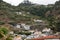 Fields and houses along west coast near Porto Moniz on Madeira Island.