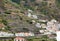 Fields and houses along west coast near Porto Moniz on Madeira Island.