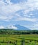 fields, mountains, sky, and god